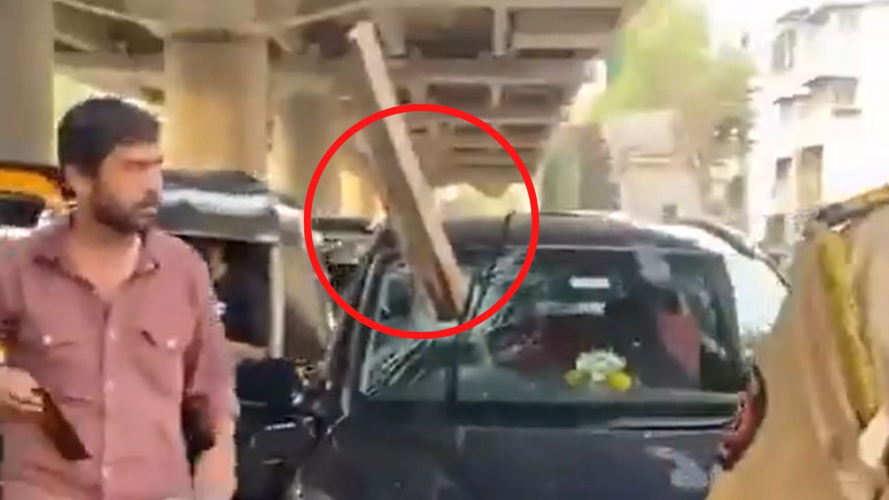 Concrete beam smashes car